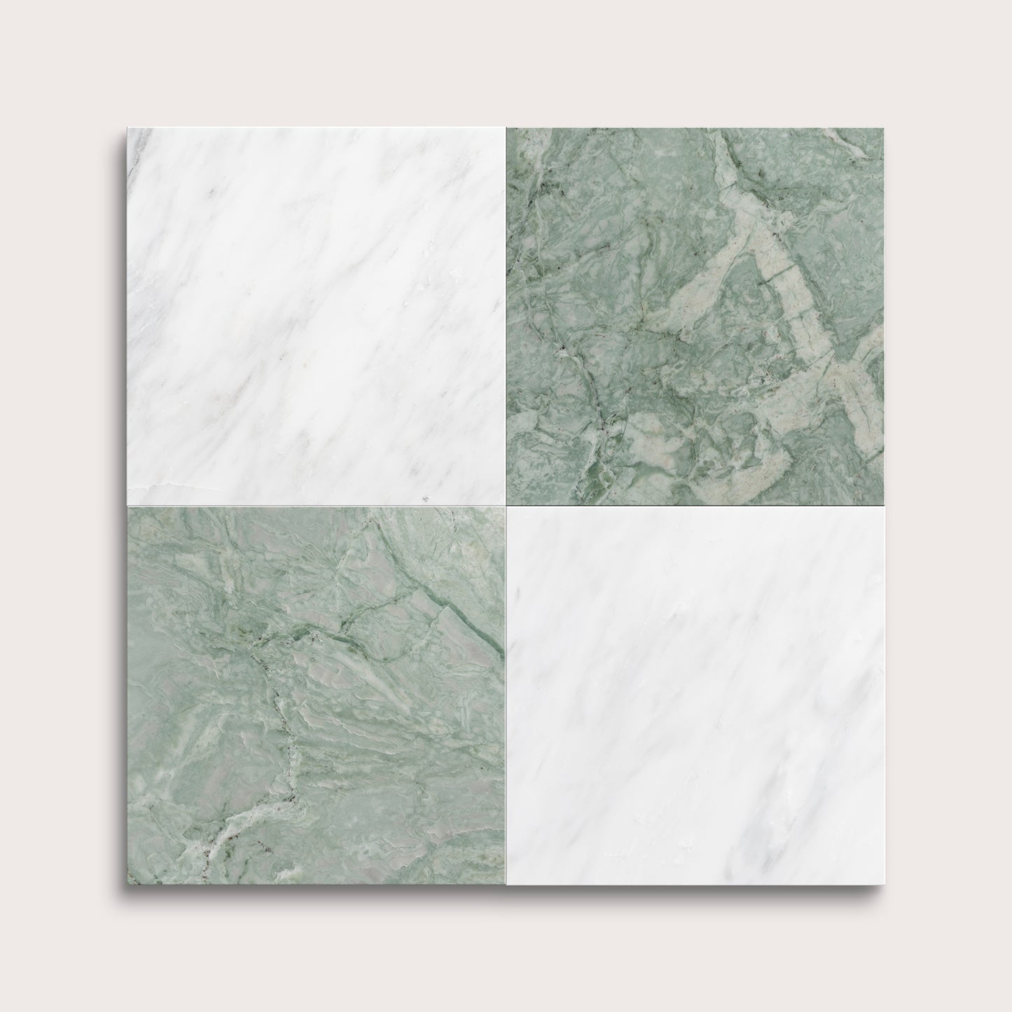 marble and limestone square tiles in checkerboard pattern on light grey background
