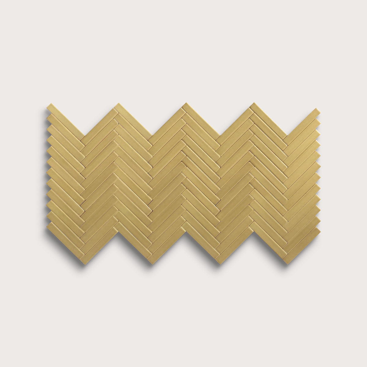 Citron ceramic tile, 1 by 6 inch herringbone mosaic, matte finish