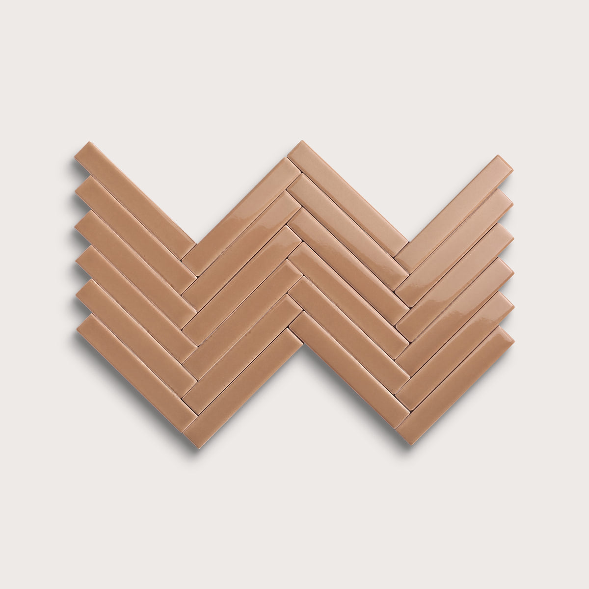 Clay ceramic tile, 1 by 6 inch herringbone mosaic, gloss finish