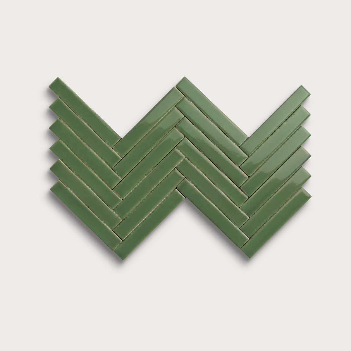 Kale ceramic tile, 1 by 6 inch herringbone mosaic, gloss finish