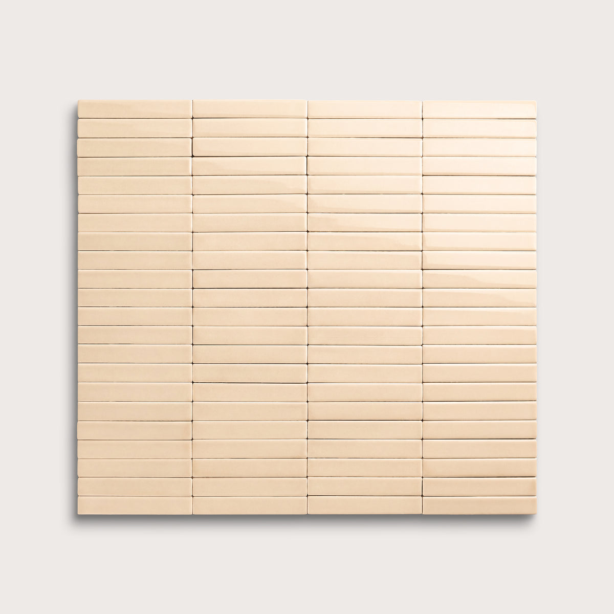 Latte ceramic tile, 1 by 6 inch stacked mosaic, gloss finish