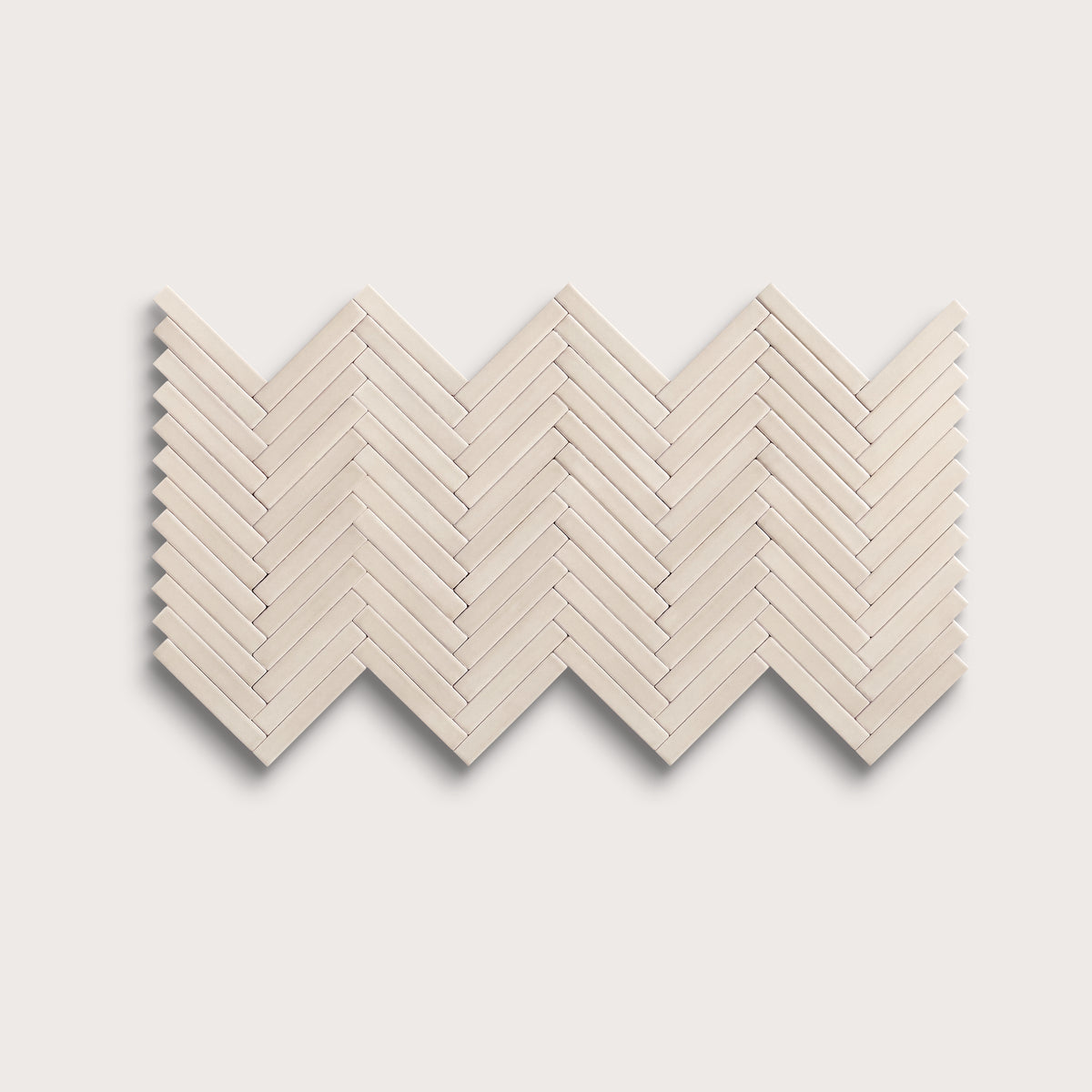 Shell ceramic tile, 1 by 6 inch herringbone mosaic, matte finish
