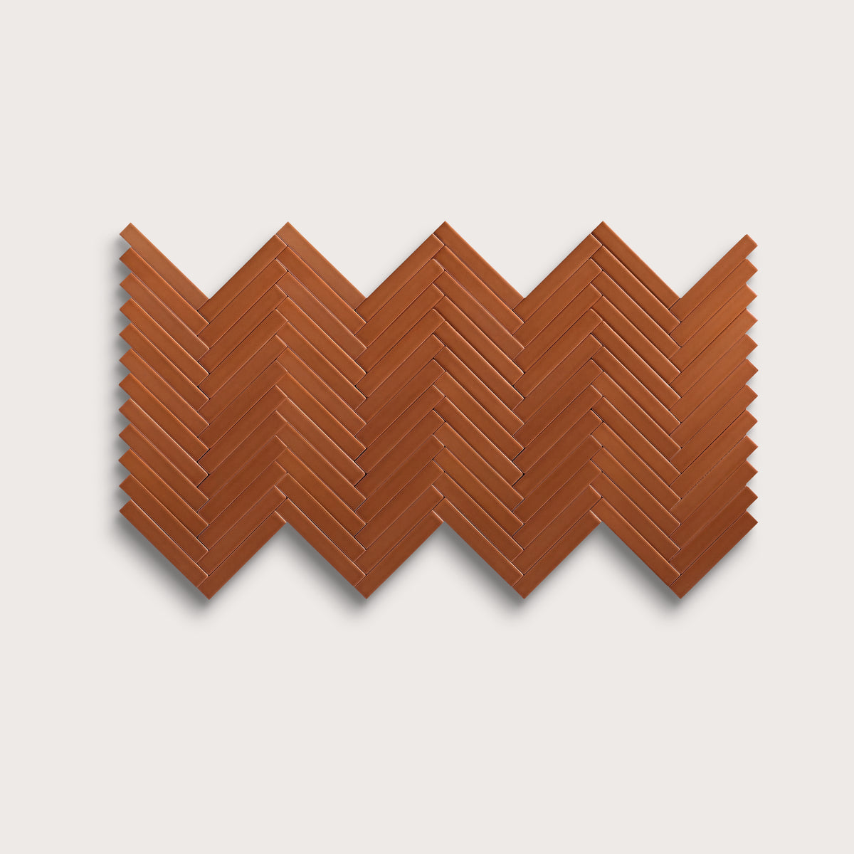 Saddle ceramic tile, 1 by 6 inch herringbone mosaic, matte finish