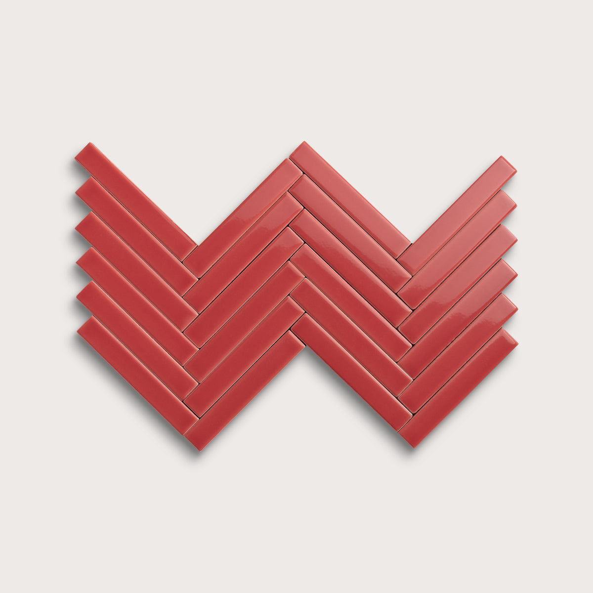 Watermelon Sugar ceramic tile, 1 by 6 inch herringbone mosaic, gloss finish