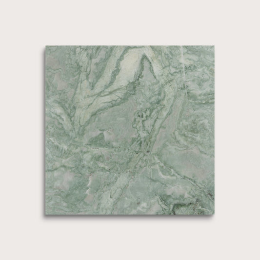 Green marble-patterned tile on a light gray background