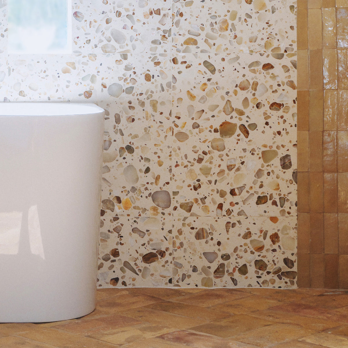brown terrazzo tile on wall in bahroom