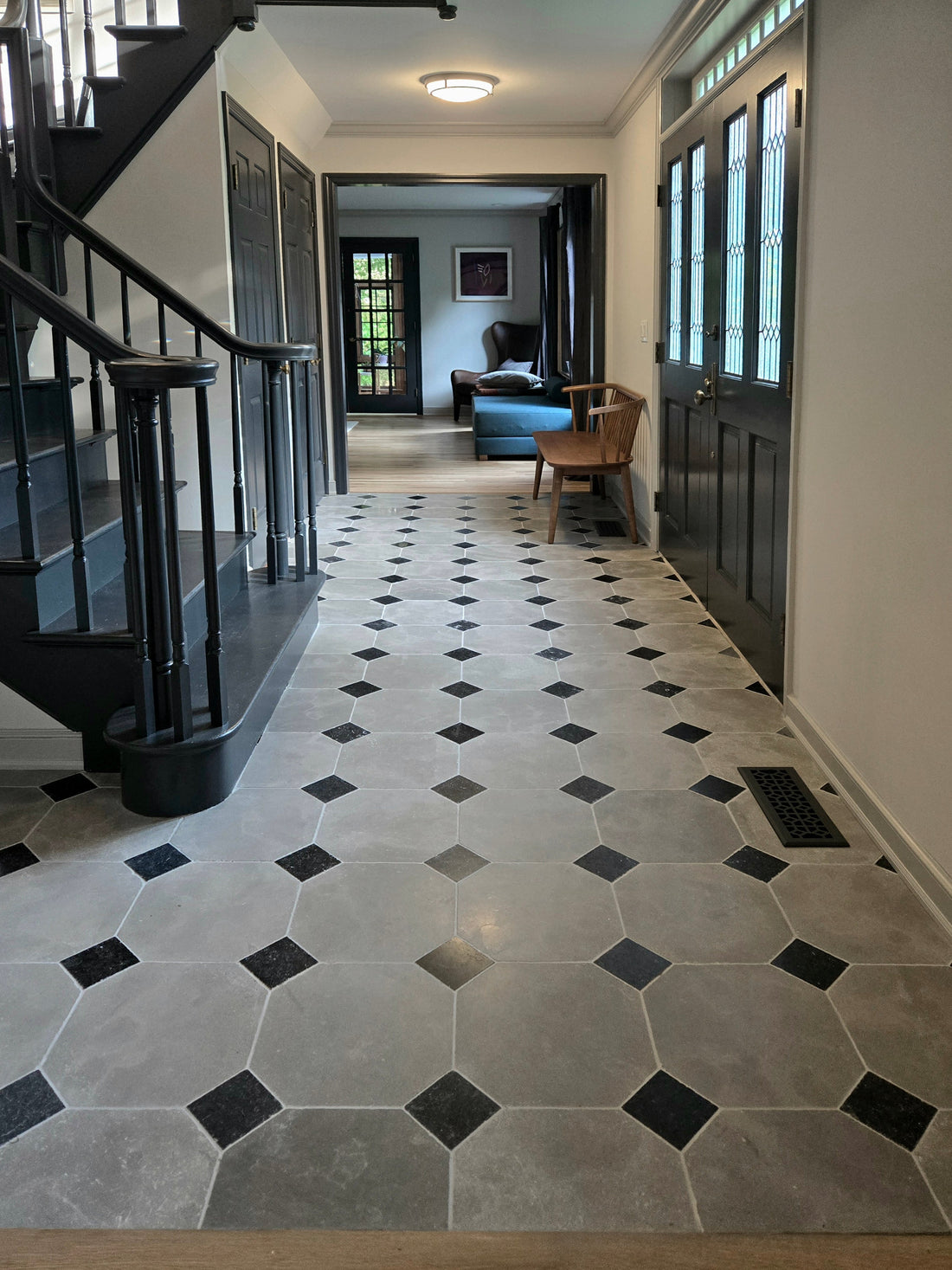 grey octagon limestone checkerboard pattern flooring in entryway