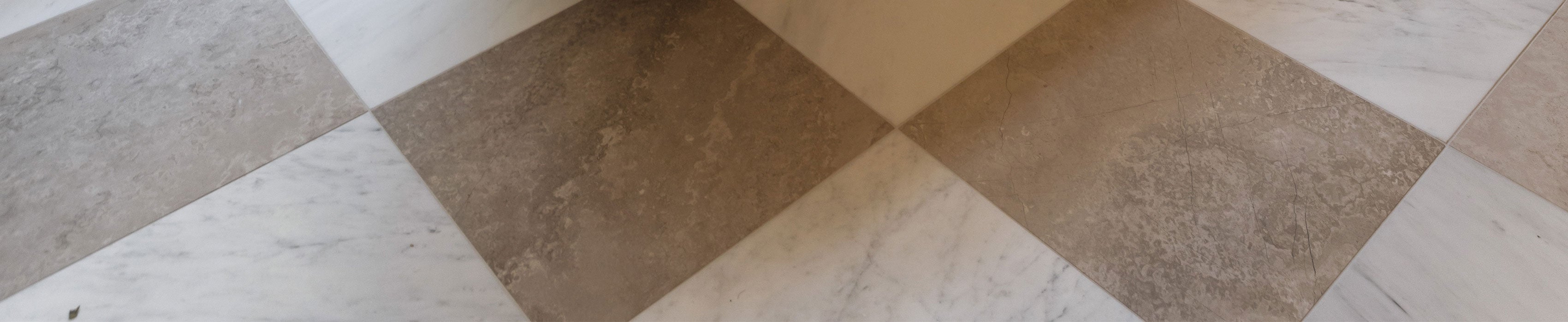 beige limestone and marble checkerboard floor