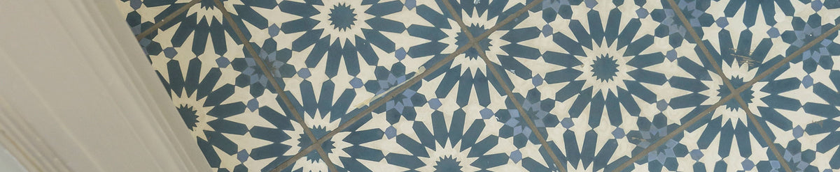 blue pattern ceramic tile on the floor