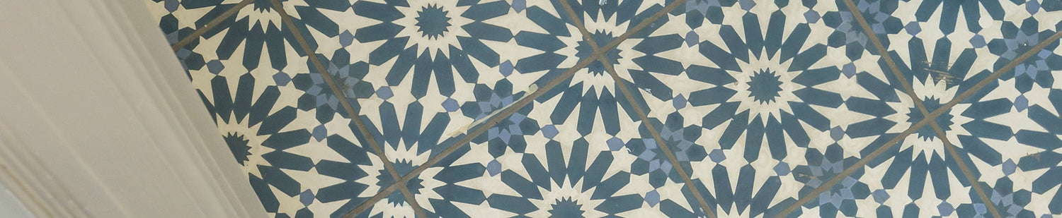 blue pattern ceramic tile on the floor