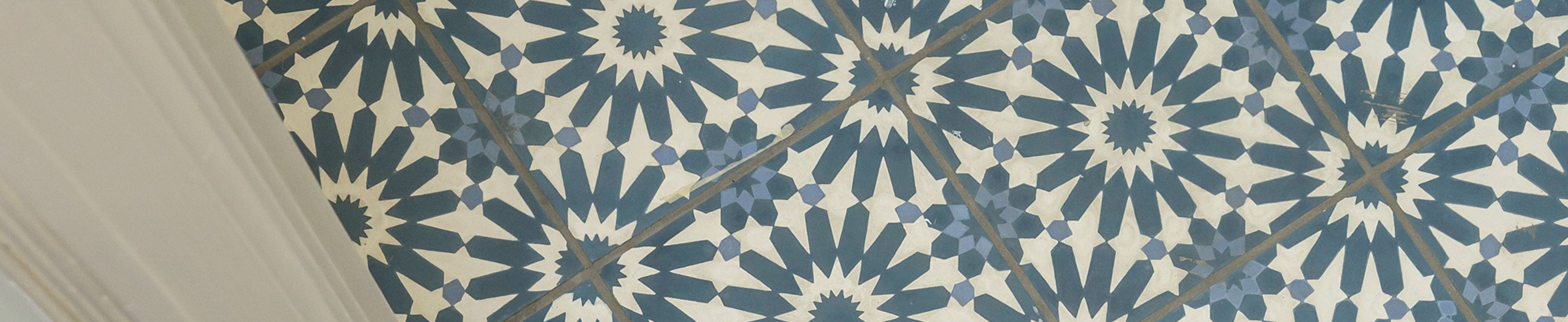blue pattern ceramic tile on the floor