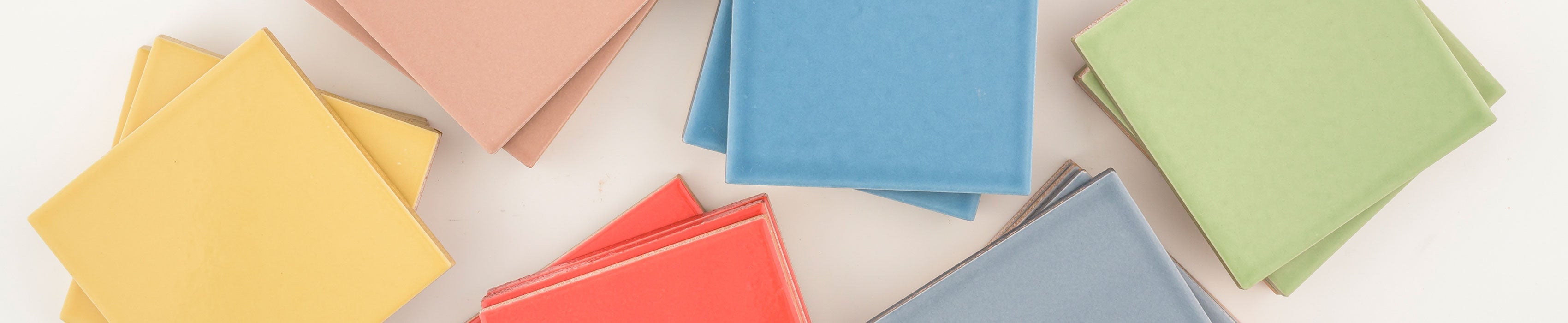 square ceramic tile in yellow, red, blue, and green stacks