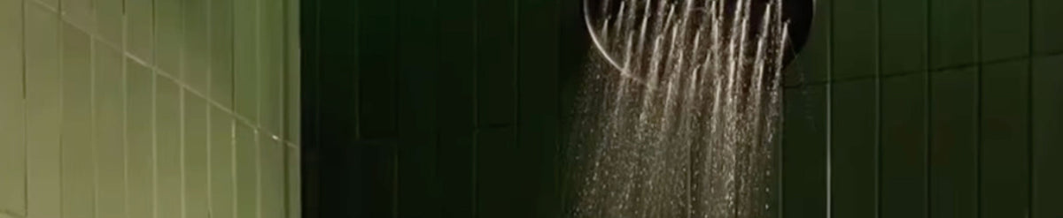 green rectangle ceramic tile in shower