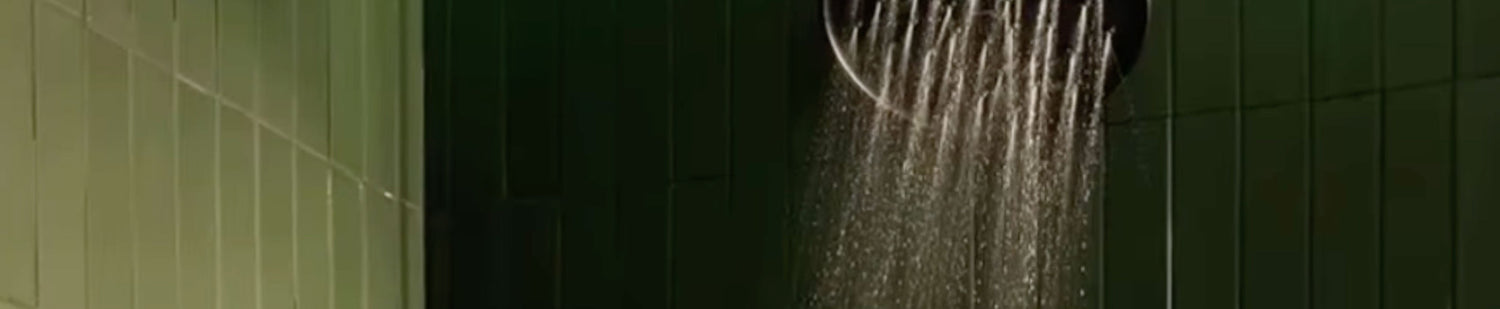 green rectangle ceramic tile in shower