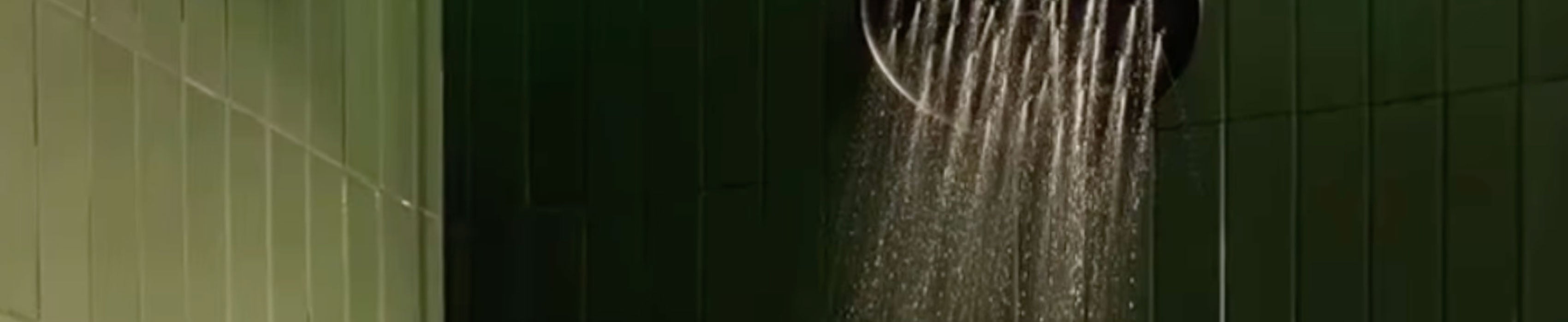 green rectangle ceramic tile in shower