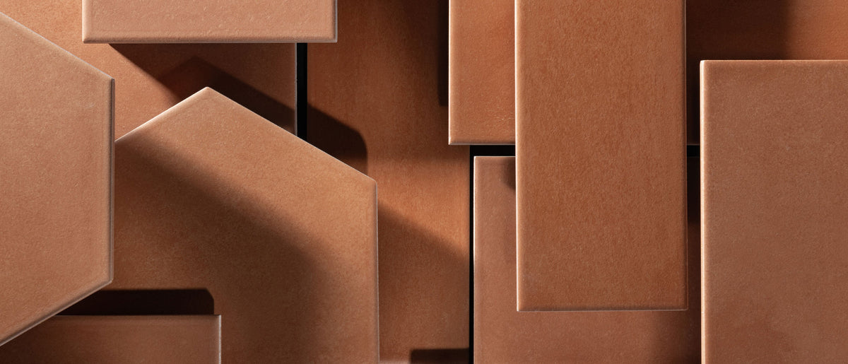 flat lay of terracotta ceramic tile in different shapes