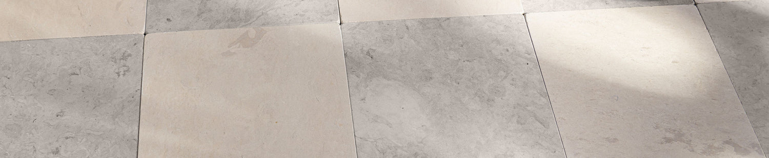 beige and grey limestone checkerboard flooring