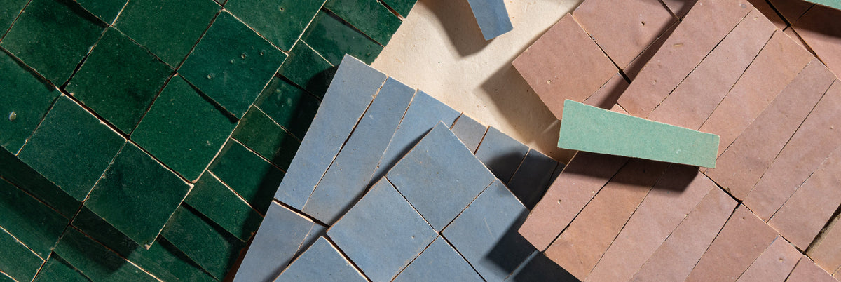 green, blue, blush zellige mosaic tile stacked and layered