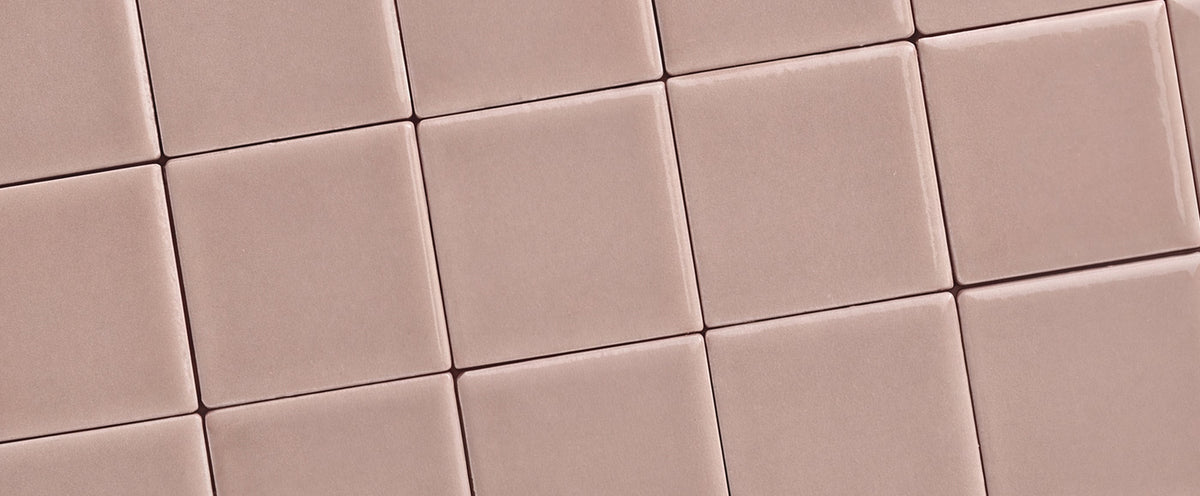 pink square ceramic tile in grid pattern