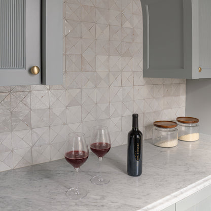 triangle zellige tile installed as backsplash in kitchen