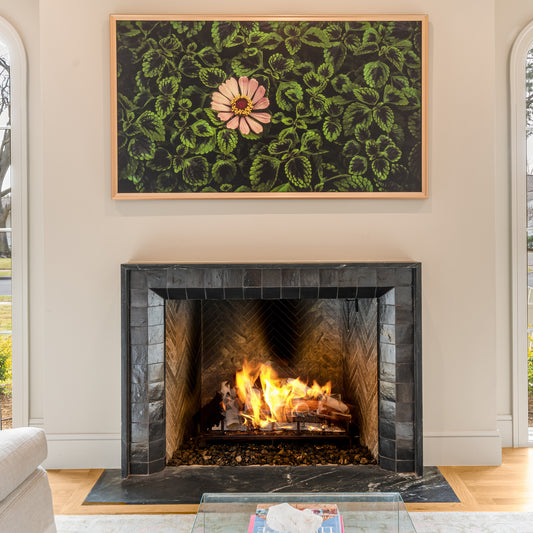 black zellige tile installed on fireplace in living room