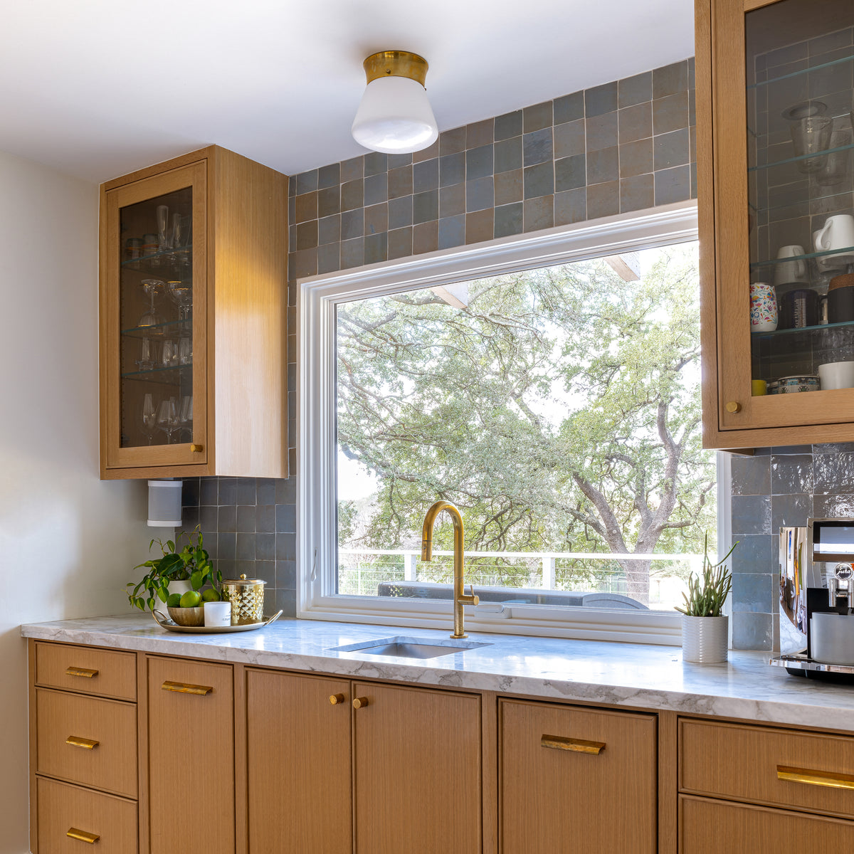 blue zellige tile installed as backsplash in kitchen