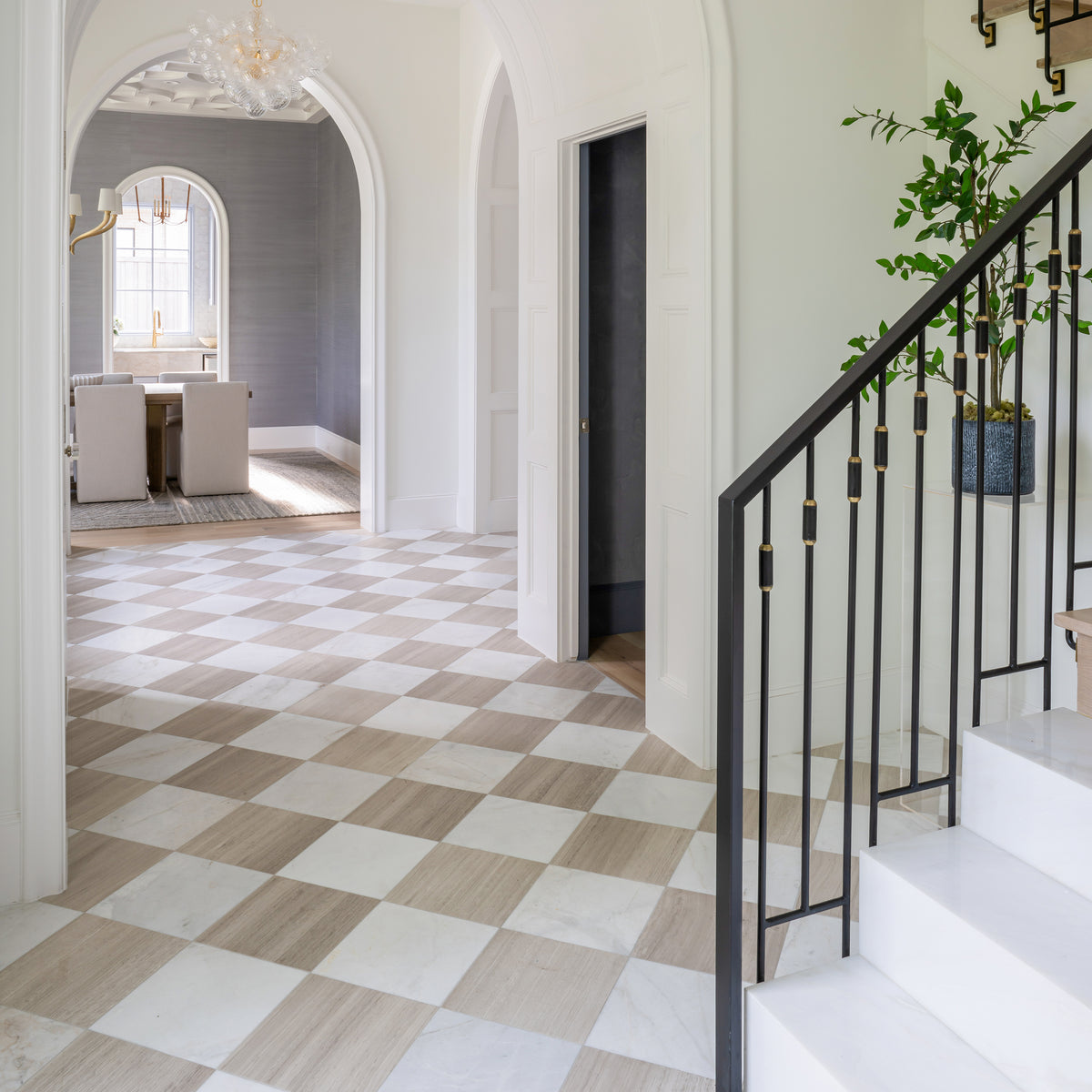 beige limestone and white marble in checkerboard pattern as flooring in entryway