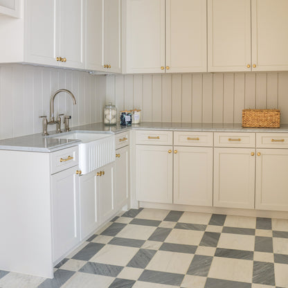 grey & white marble tile on floor in a plaid or grid pattern