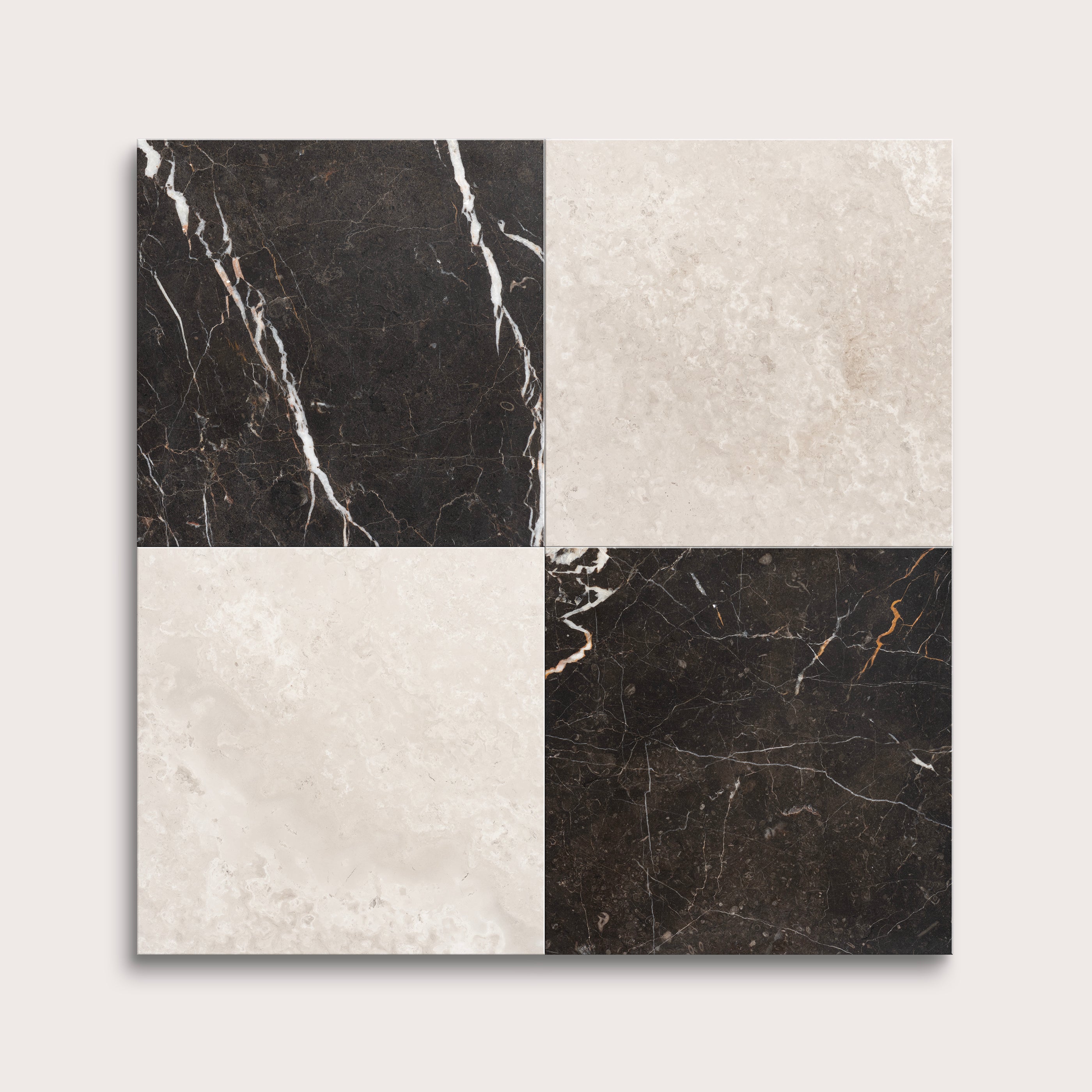 Four square tiles with black and white marble patterns on a light gray background