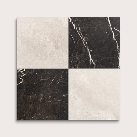 Four square tiles with black and white marble patterns on a light gray background