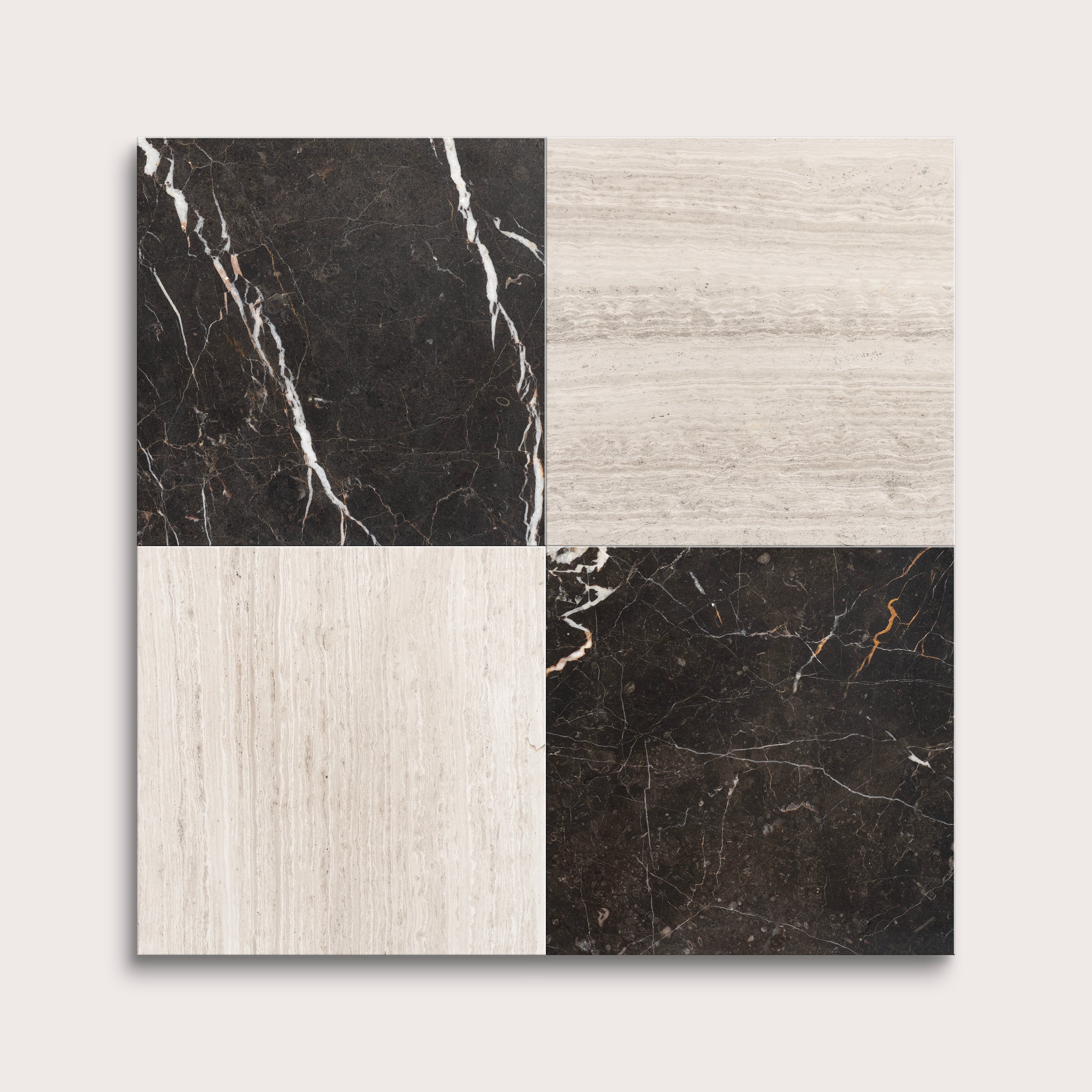 Four square tiles with different marble patterns on a white background