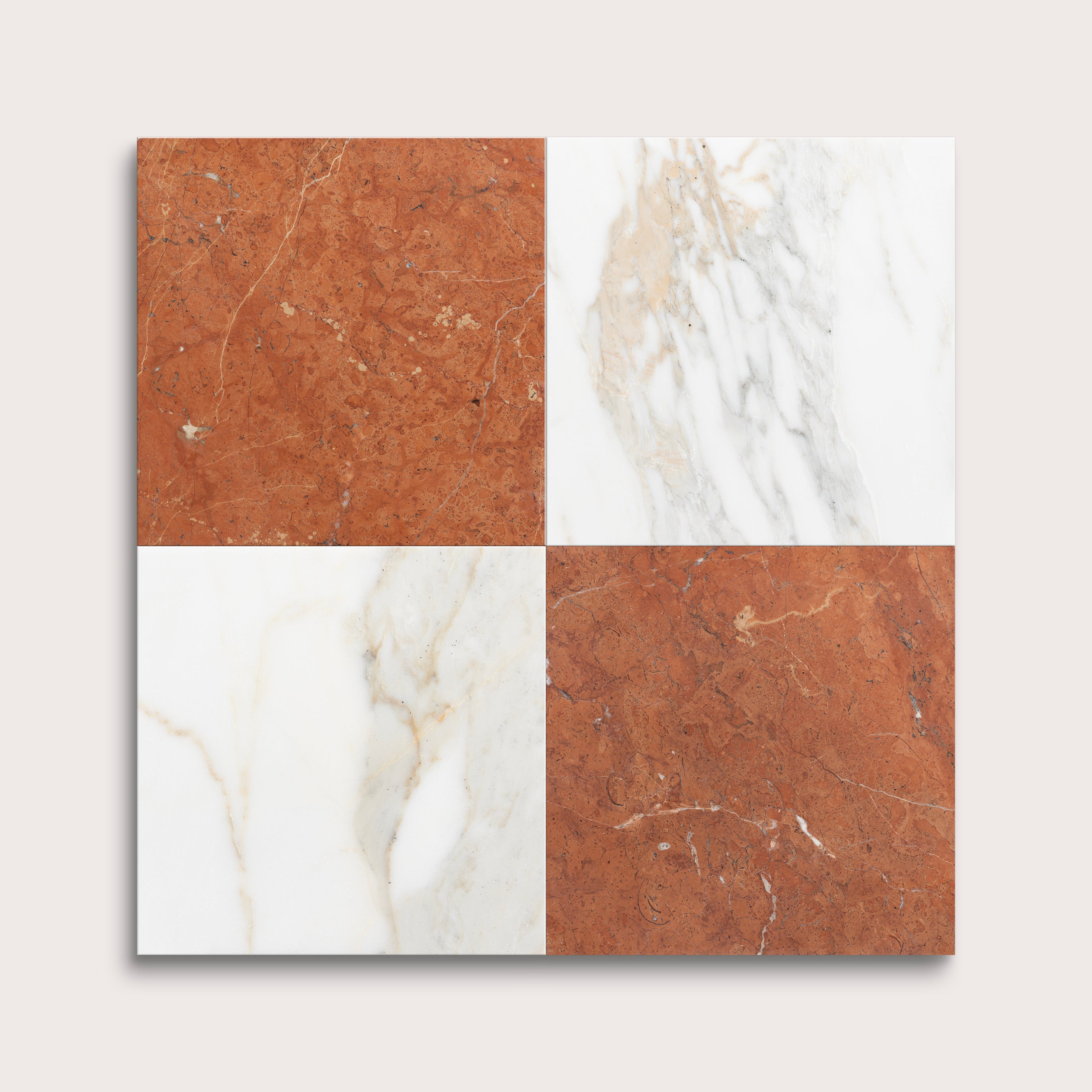 Four square tiles with different marble patterns on a light gray background