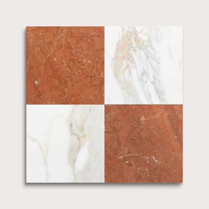 Four square tiles with different marble patterns on a light gray background