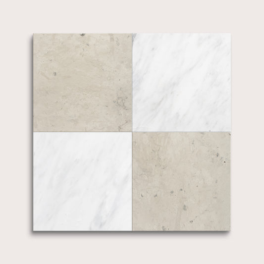 Four square tiles in gray and white on a light gray background