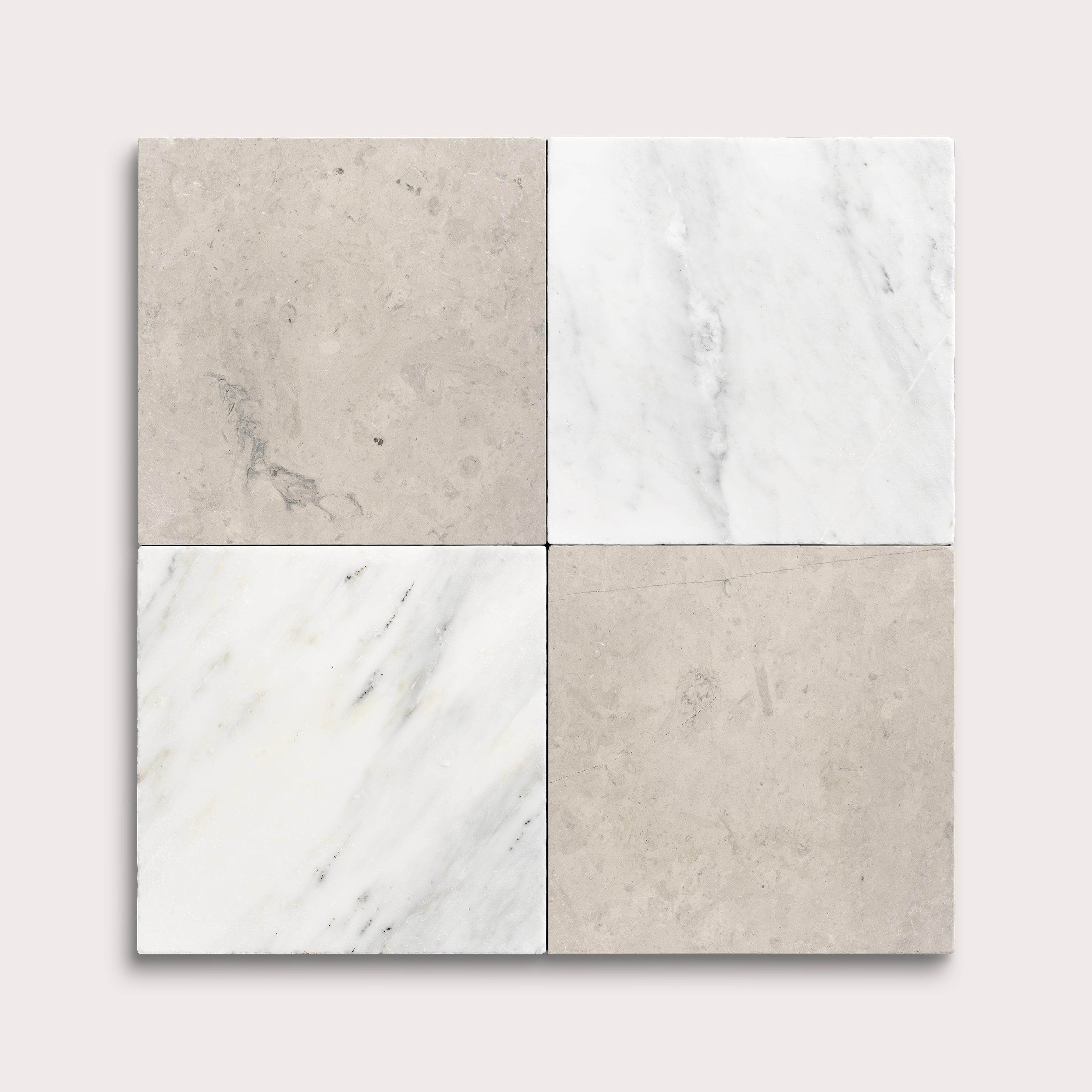 Four square tiles with marble and concrete textures on a light gray background