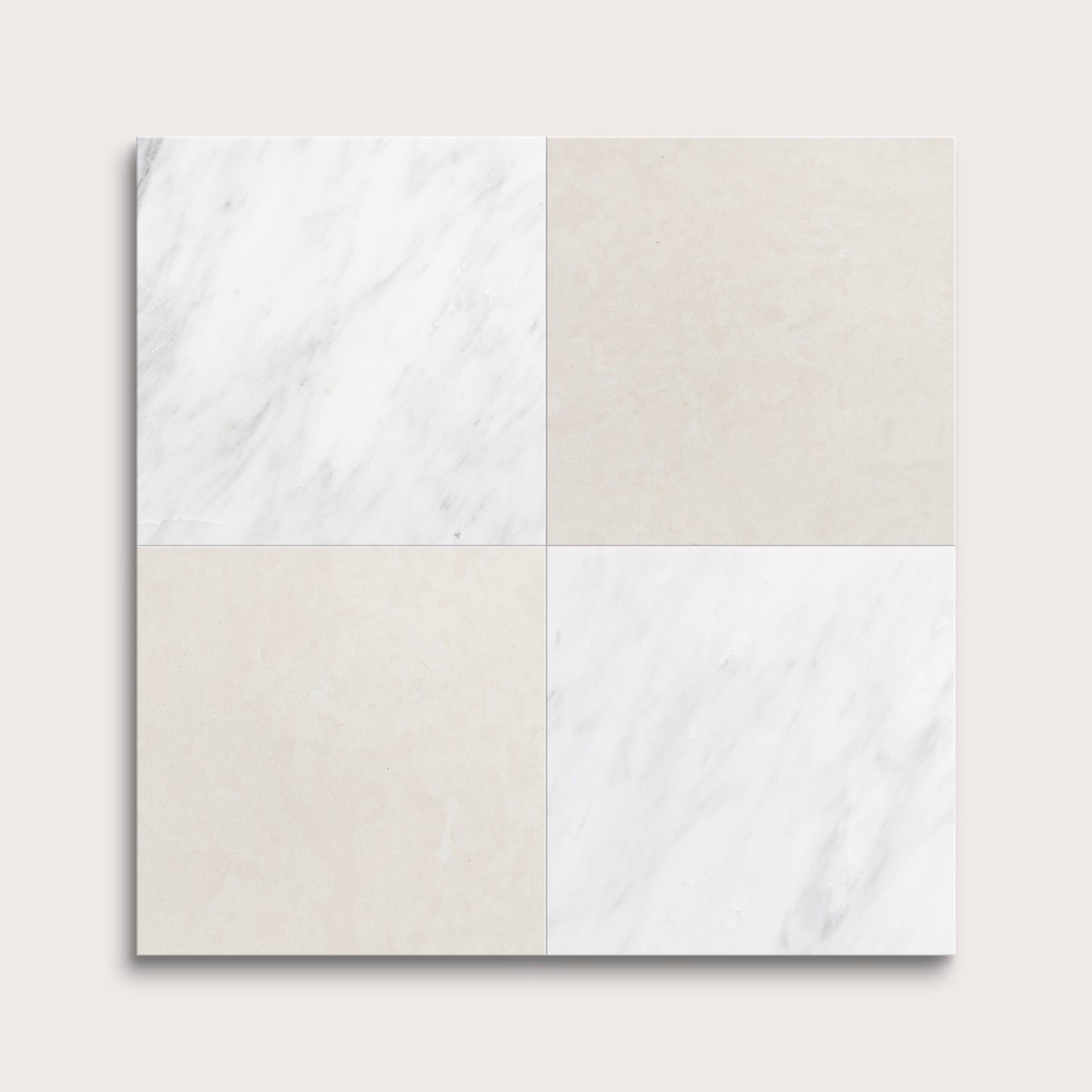 Four square tiles with marble patterns on a light gray background