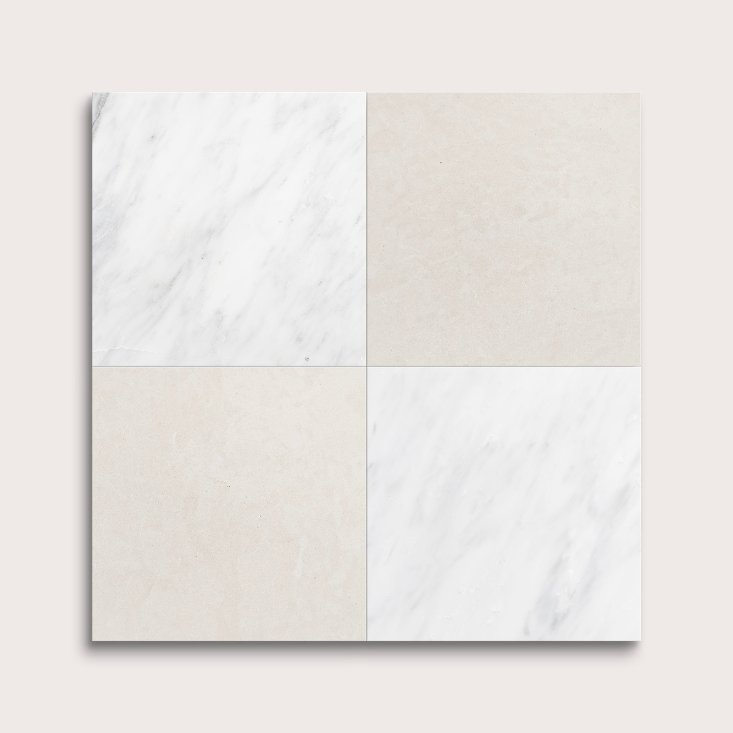Four square tiles with marble patterns on a light gray background