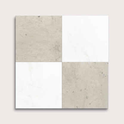 Four square tiles with beige and white patterns on a light gray background