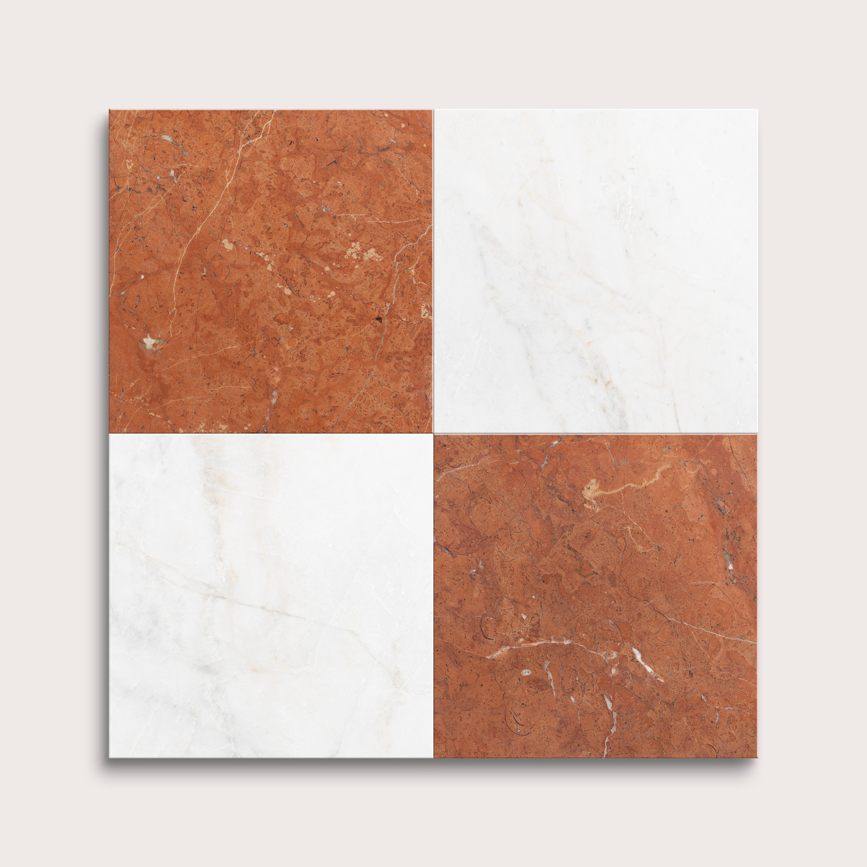 Four square tiles with brown and white marbled patterns on a light gray background