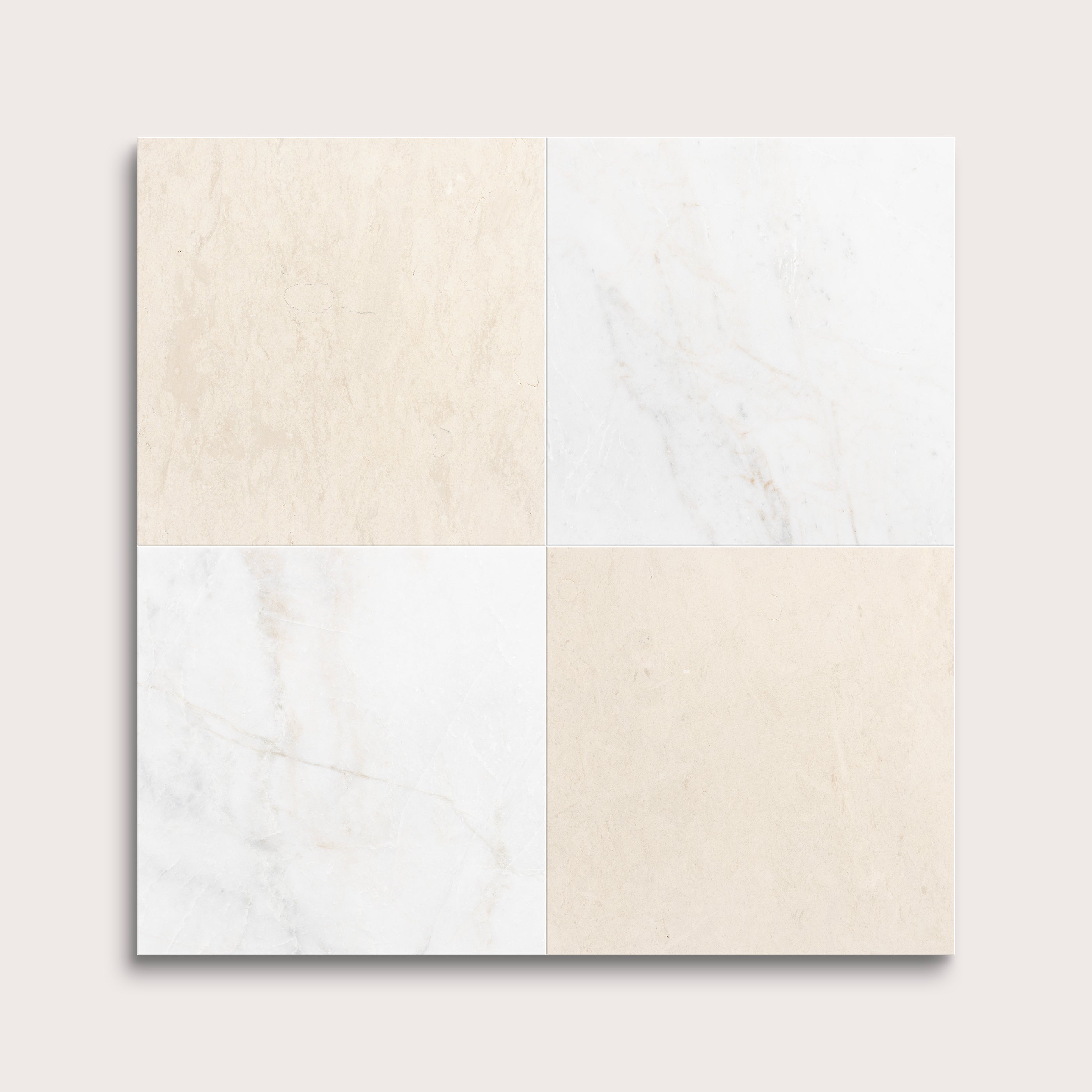 Four square tiles with beige and white marble patterns on a light gray background