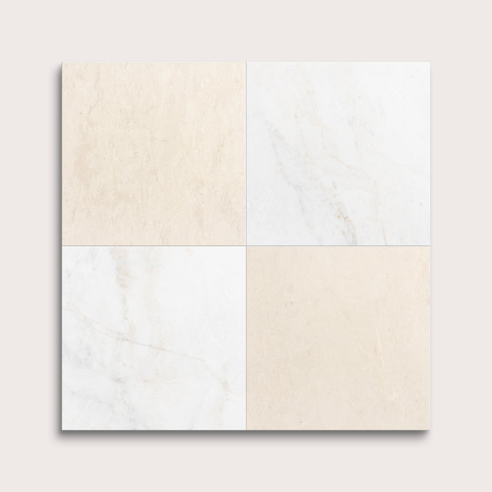 Four square tiles with beige and white marble patterns on a light gray background