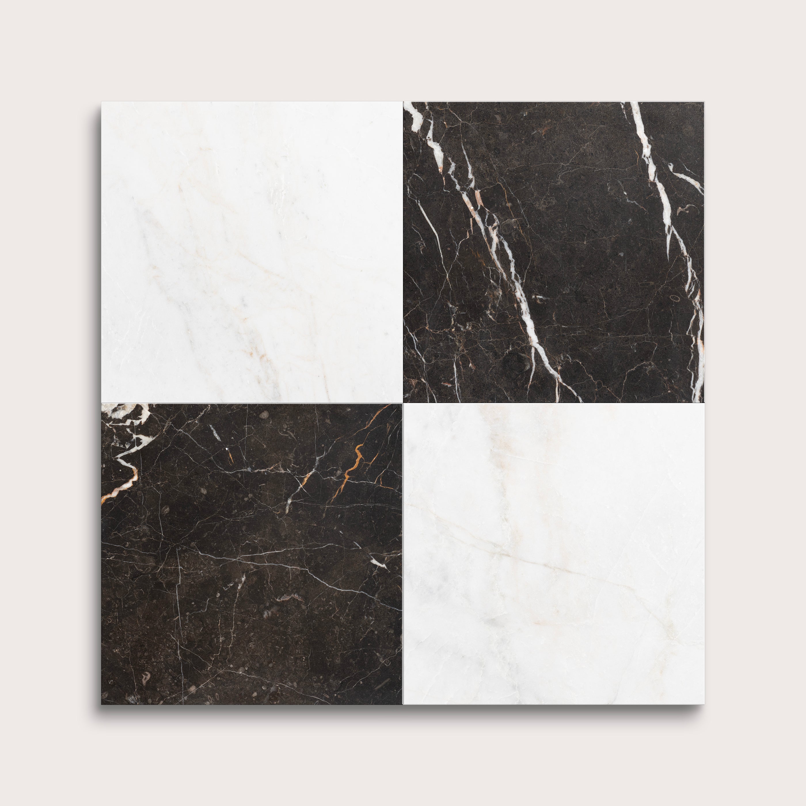 Four square tiles with different marble patterns on a white background