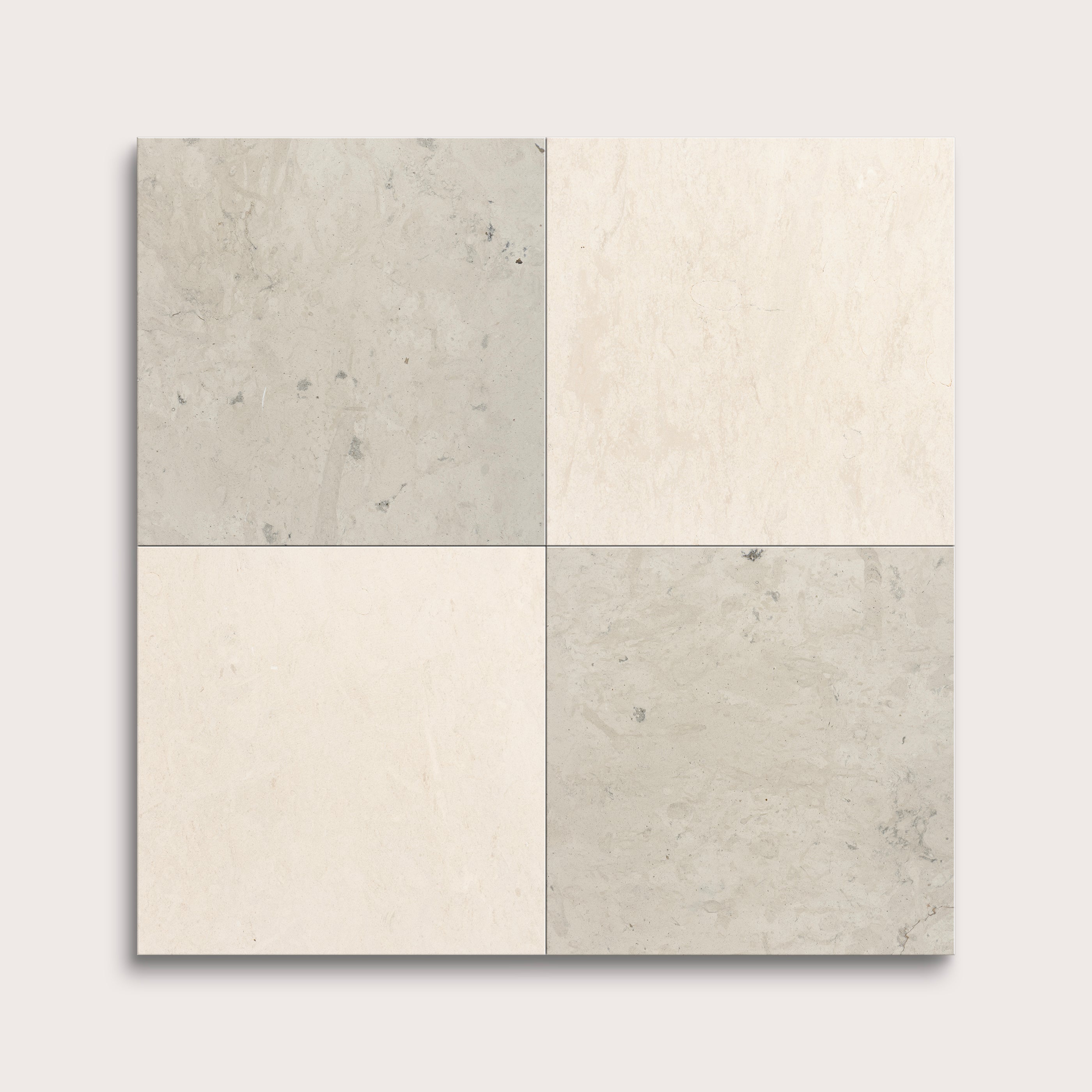 Four square tiles in gray and beige on a white background