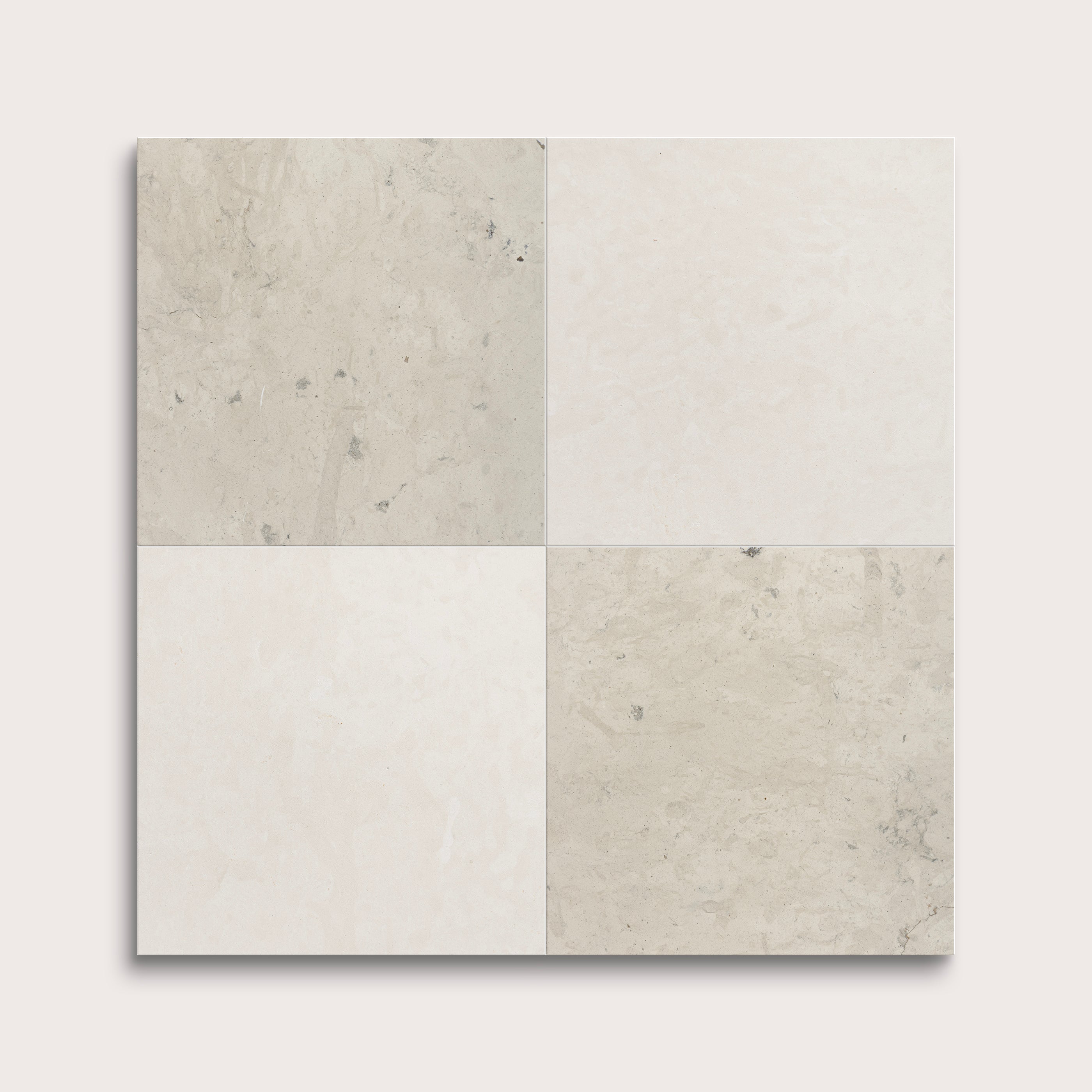 Four square tiles in gray and beige on a white background