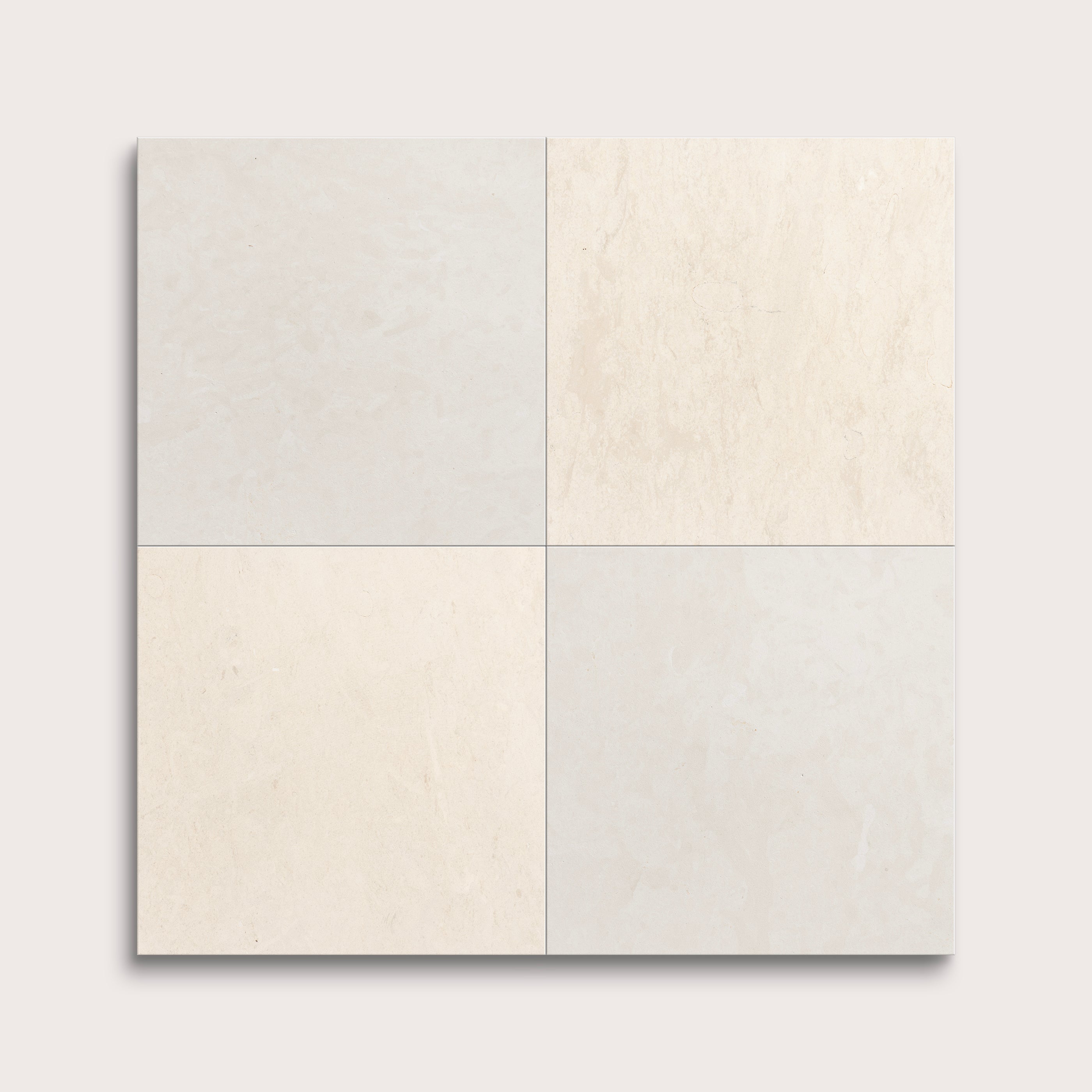 Four square tiles in light gray, beige, and white on a light gray background