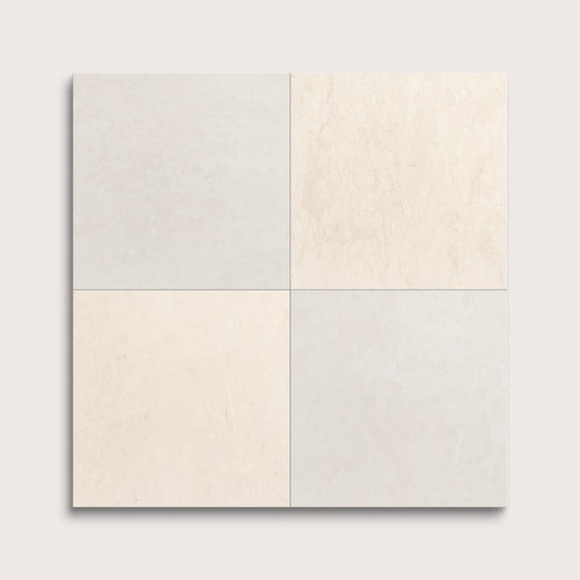 Four square tiles in light gray, beige, and white on a light gray background