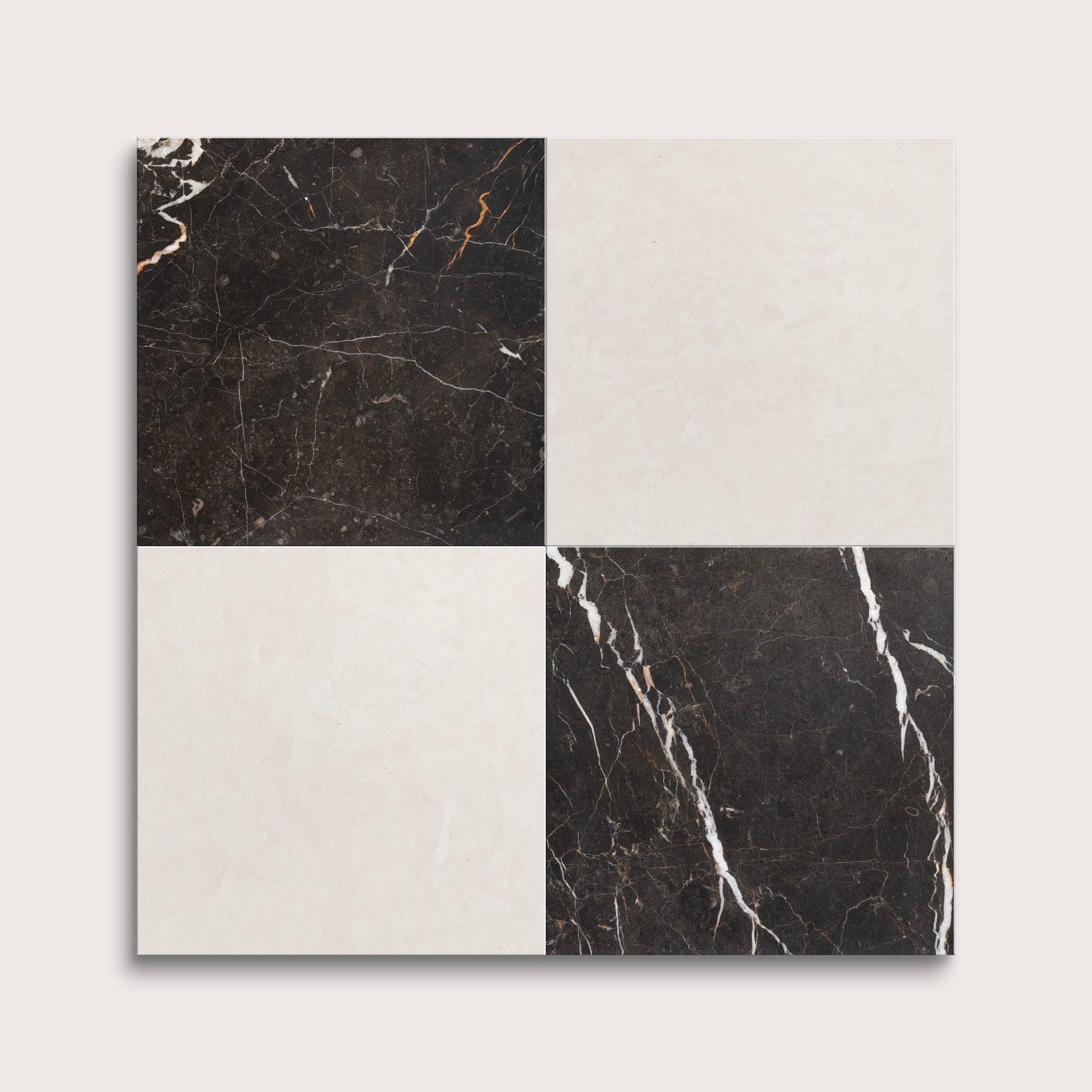 Four square tiles with black and white marble patterns on a light gray background