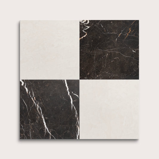 Four square tiles with black and white marble patterns on a light gray background