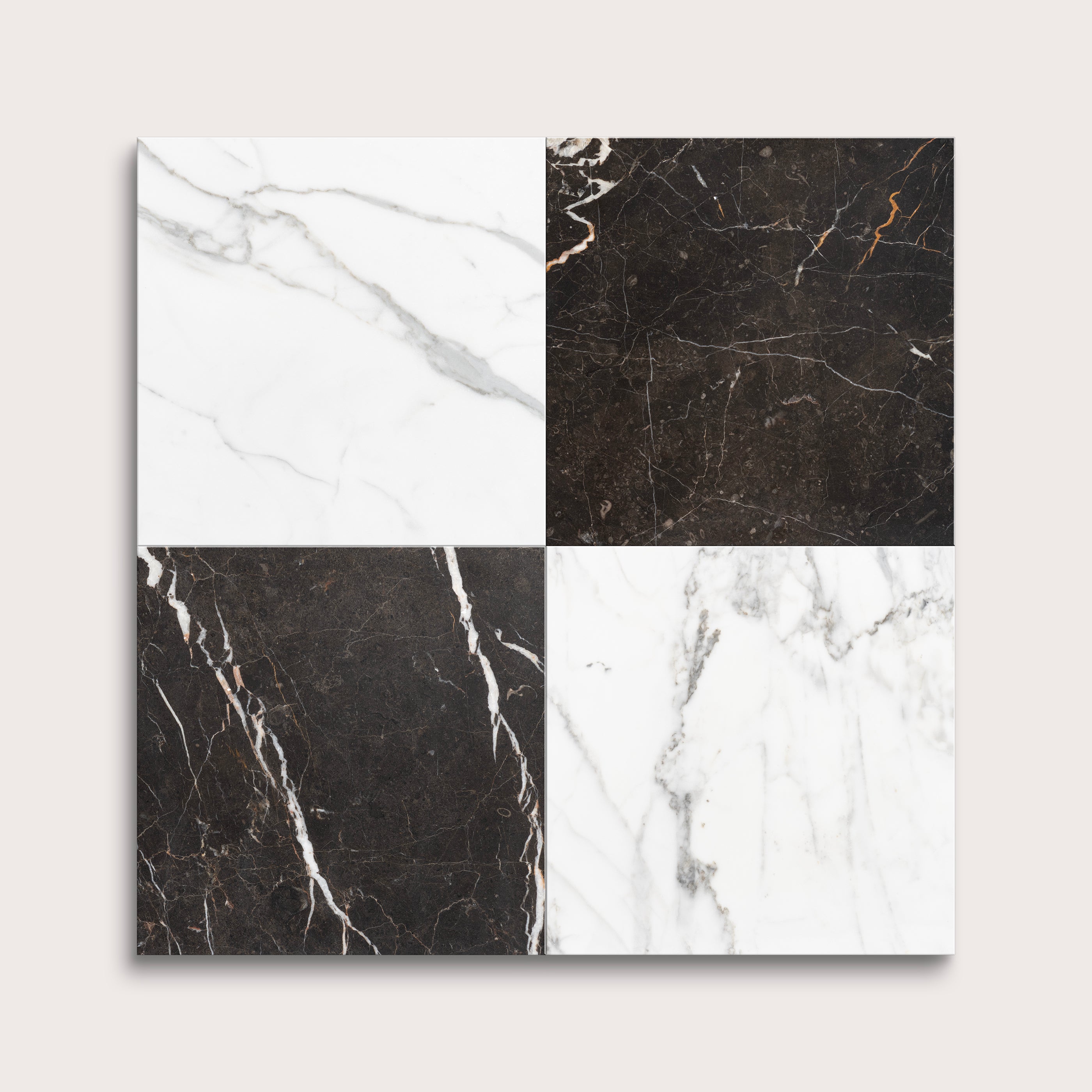 Four square tiles with different marble patterns on a light gray background