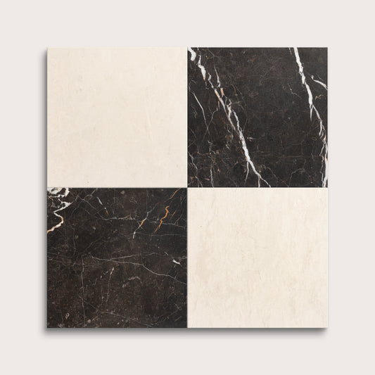 Four square tiles with black and beige marble patterns on a white background